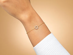 Model wearing sterling silver 30th birthday sunburst bracelet.