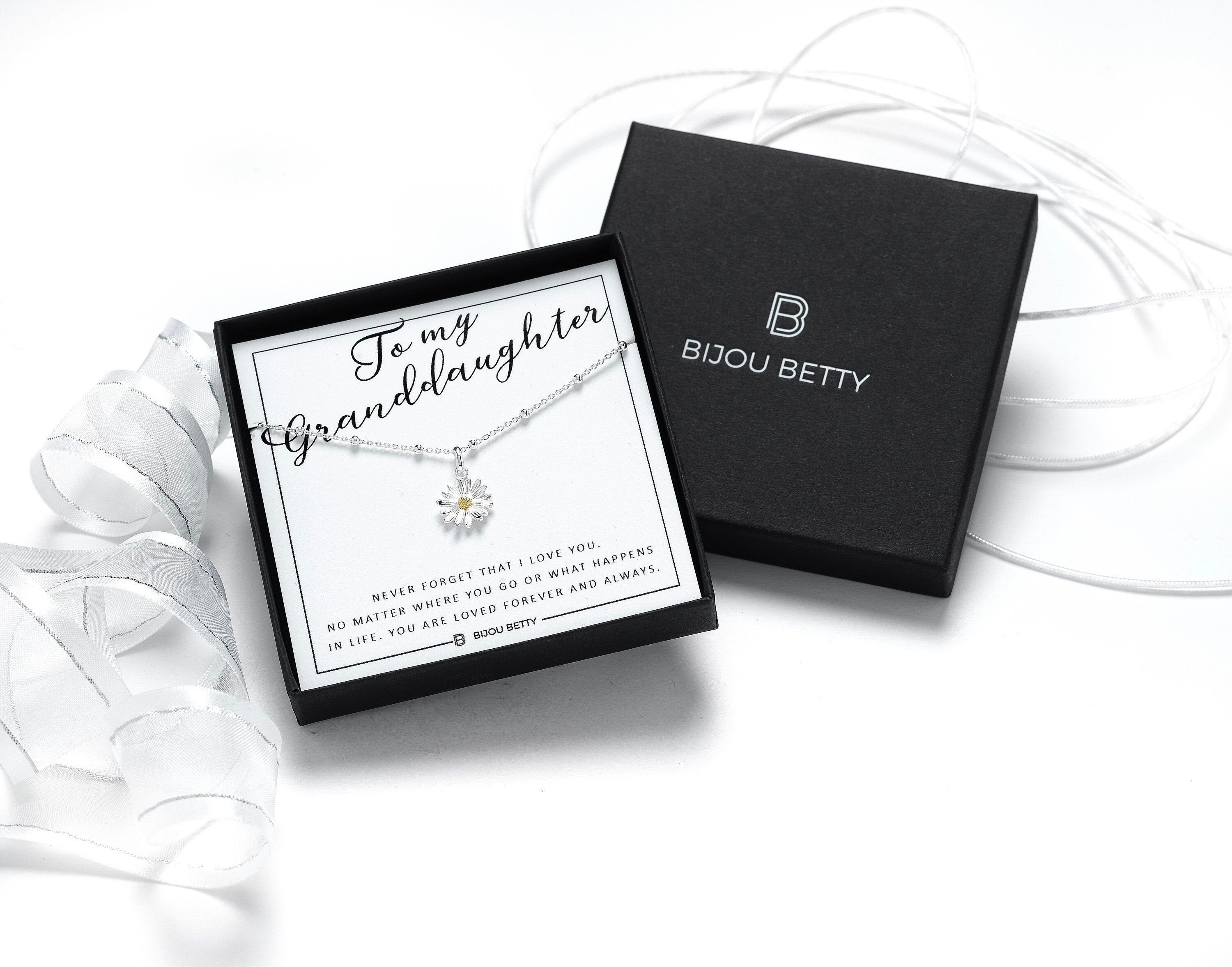 Sterling silver granddaughter necklace gift, 12mm daisy pendant, 16-18 inch chain, in Bijou Betty gift box with bag.