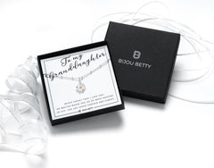 Sterling silver granddaughter necklace gift, 12mm daisy pendant, 16-18 inch chain, in Bijou Betty gift box with bag.
