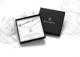 Sterling silver granddaughter necklace gift, 12mm daisy pendant, 16 or 18-inch chain, in Bijou Betty gift box with bag.
