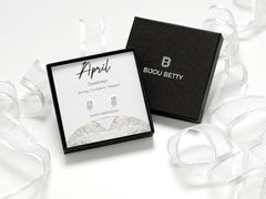 Sterling silver April birthstone earrings with 5mm CZ studs in Bijou Betty gift box.