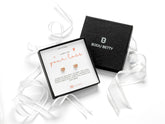 Sterling silver sympathy earrings with CZ hearts in Bijou Betty gift box.