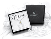 Sterling silver daisy necklace gift for niece, 12mm pendant, 16-18 inch chain, in Bijou Betty gift box with bag and card.