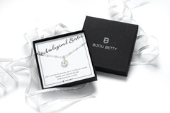 Sterling silver daisy necklace gift for best friend, 12mm gold-plated pendant, 16-18 inch chain, in Bijou Betty gift box.