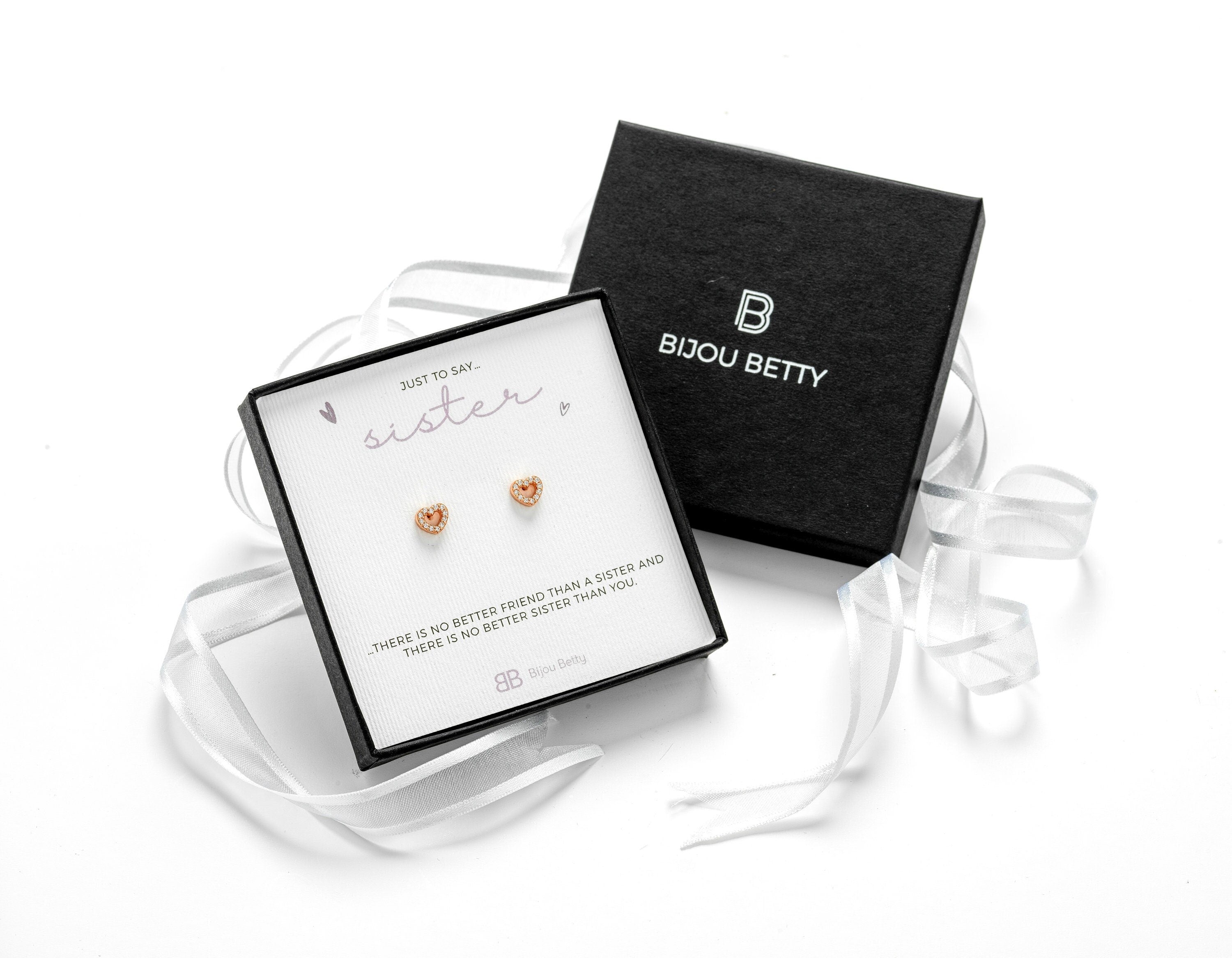 Sterling silver heart earrings with cubic zirconia stones in Bijou Betty gift box.