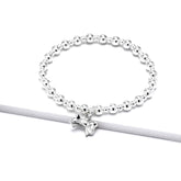 Sterling silver bow bracelet with 15mm charm in Bijou Betty gift box.
