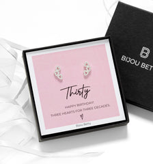 Gift bag, tissue and ribbon.