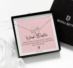 Close-up of Bijou Betty’s 925 silver best friend necklace with 18mm x 10mm heart and circle pendant, cubic zirconia gems, on 16–18 inch chain and luxury gift box.