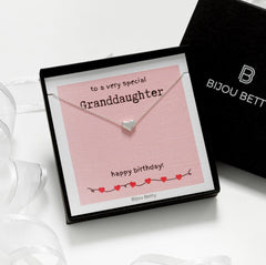Close up of silver heart necklace in Bijou Betty gift box with card, To a special Granddaughter - Happy Birthday!