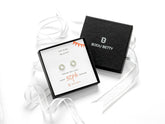 Sterling silver 50th birthday sunburst earrings in Bijou Betty gift box.