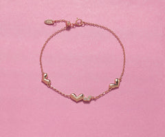 925 silver 40th birthday heart bracelet, 4 hearts with cubic zirconia.