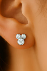 Model wearing 30th birthday gift, sterling silver three CZ stone earrings.
