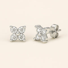 Close-up of 925 silver flower CZ earrings, perfect for work bestie birthday or leaving gift for office friends.