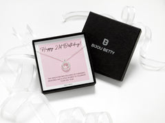 21st birthday jewellery. A solid sterling silver three-ring necklace presented in gift box.