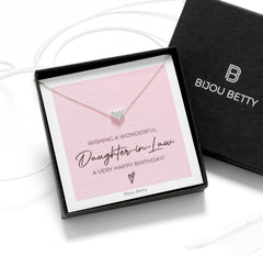 Close up of sterling silver daughter-in-law heart necklace.