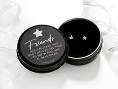 Close up of Bijou Betty’s friend gift set, gold-plated 5.5mm star stud earrings in gift box with quote Friends - are like stars…