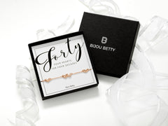 Rose gold heart bracelet in Bijou Betty gift box with card Forty - FOUR HEARTS FOR FOUR DECADES.