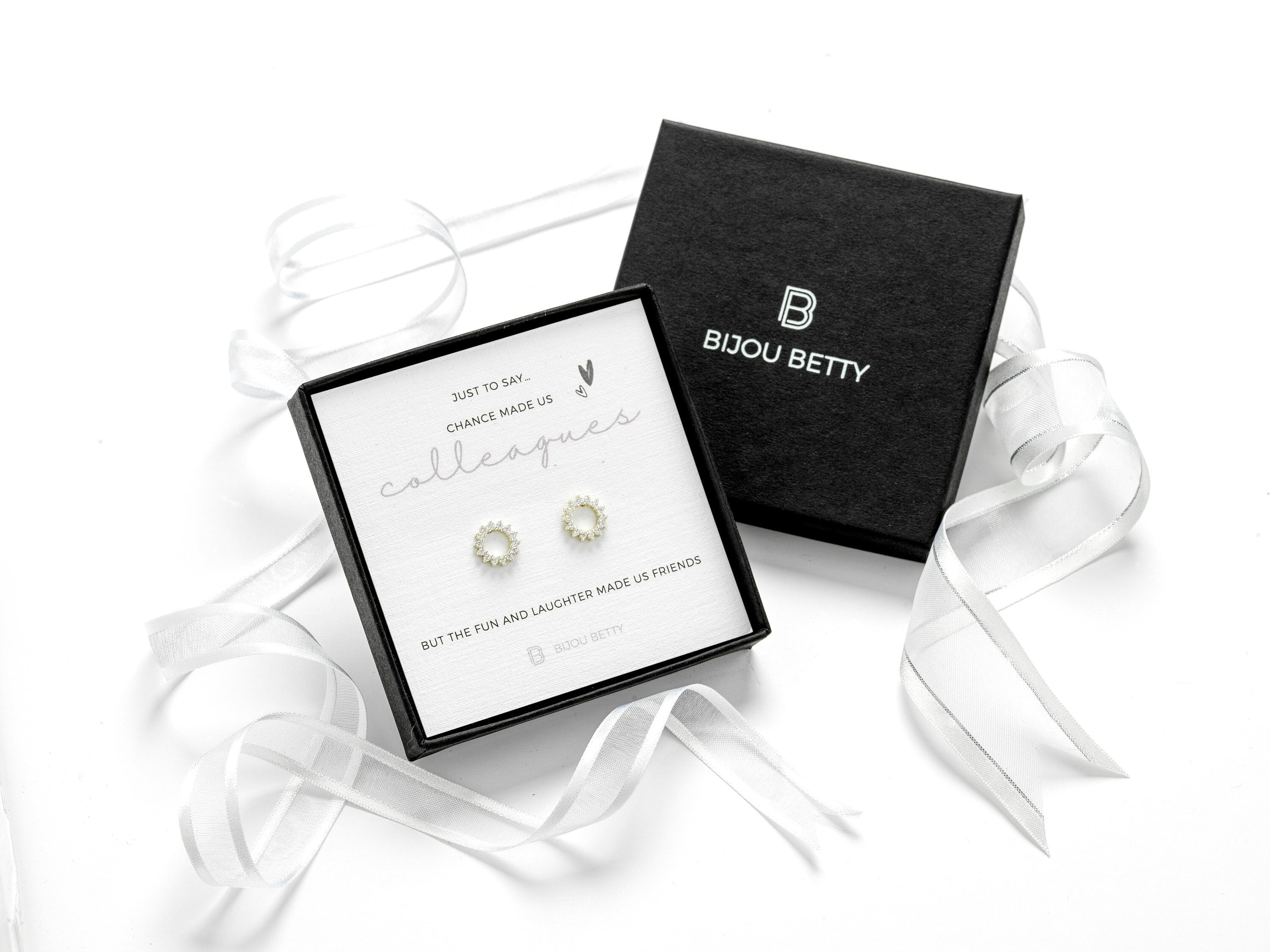 Sterling silver earrings for colleague gift with sunburst design, cubic zirconia, 10mm, in Bijou Betty gift box.