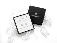 Sterling silver earrings for colleague gift with sunburst design, cubic zirconia, 10mm, in Bijou Betty gift box.