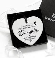 Close-up of 75mm ceramic heart with black satin ribbon, perfect for Christmas gifts for stepdaughters.