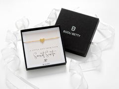 18k gold-plated 10mm heart bracelet in Bijou Betty luxury box with secret santa card, ideal for daughters.