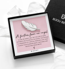 A feather from an angel sympathy gift, a feather enamel pin badge.