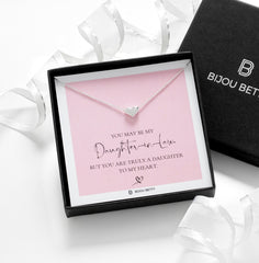 Close-up of 925 silver heart necklace with rose gold plate, perfect for wedding day gifts.