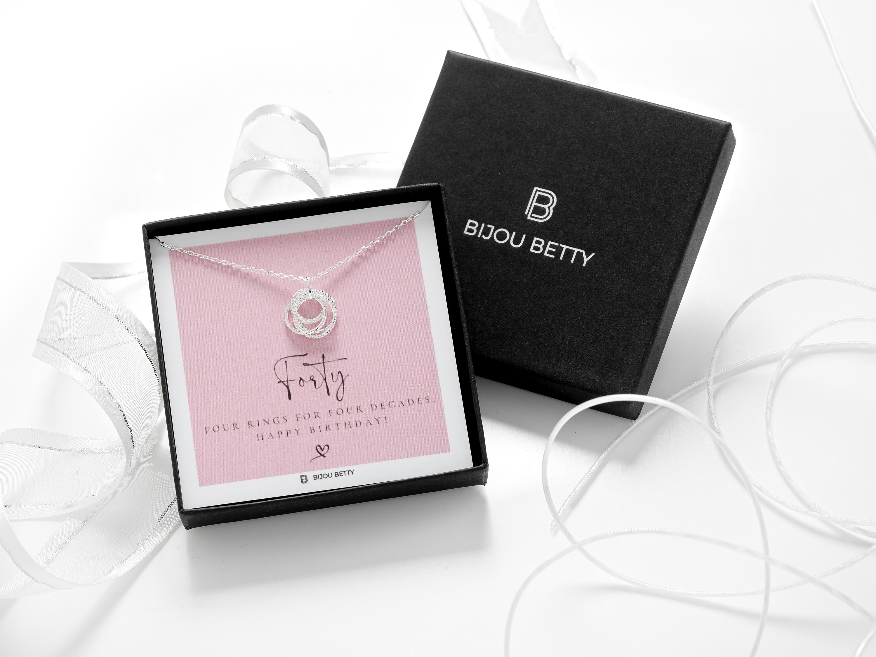 Sterling silver four-ring necklace with 10mm CZ in Bijou Betty box with 40th birthday card, ideal for mums.