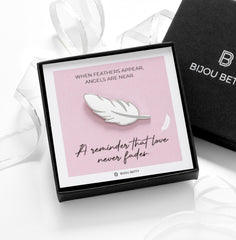 Close up of an enamel pin badge.