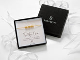 18k gold-plated 6mm 3 heart bracelet in Bijou Betty box with 21st birthday card, ideal for daughters.
