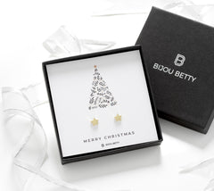Close-up of 925 silver star earrings with gold-plated finish, perfect for Christmas gifts for sisters.
