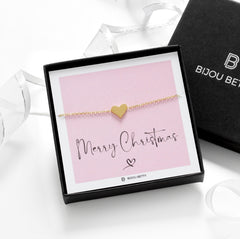 Close-up of gold-plated heart bracelet, perfect for Christmas gifts for mums.