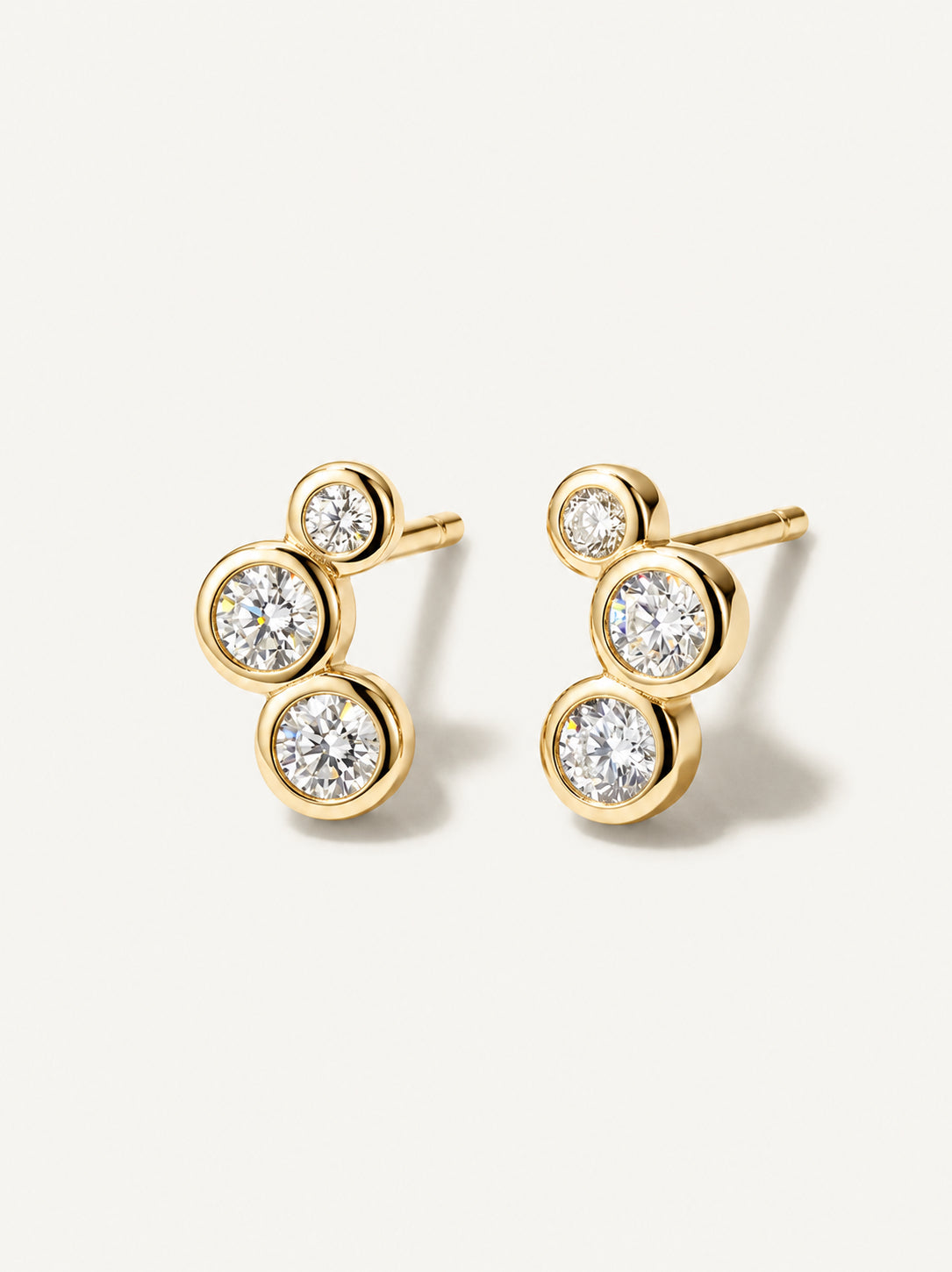 14k gold plated cubic zirconia stud earrings on solid 925 sterling silver.