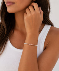 Model wearing 4 ring decades bracelet