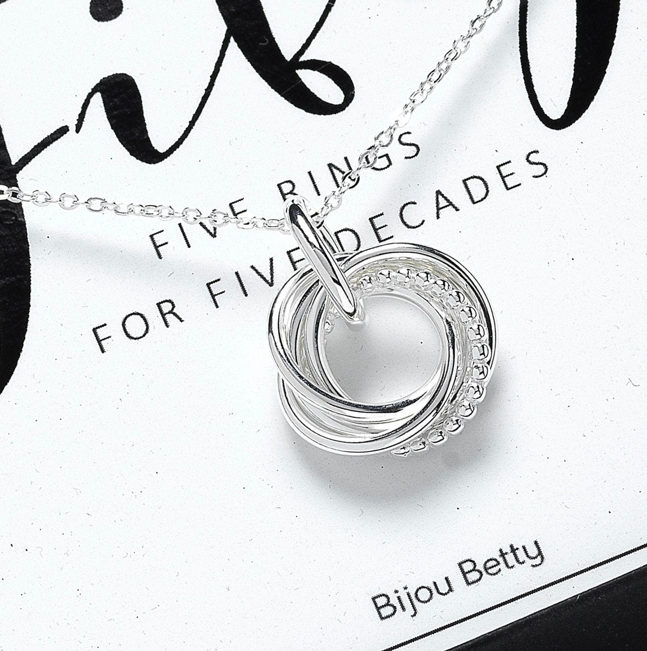 Sterling silver 50th birthday circle necklace with five rings.
