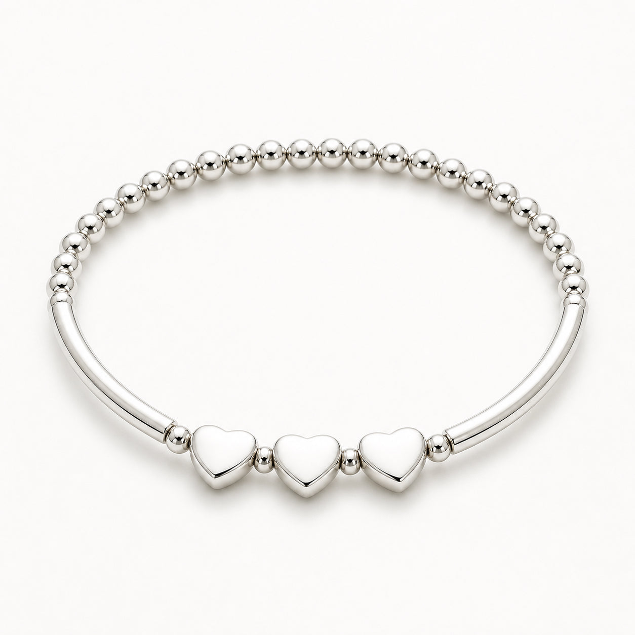 Silver 30th birthday bracelet with heart-shaped charms on a white background