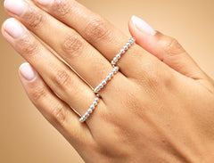 Model wearing sterling silver fidget spinner ring.