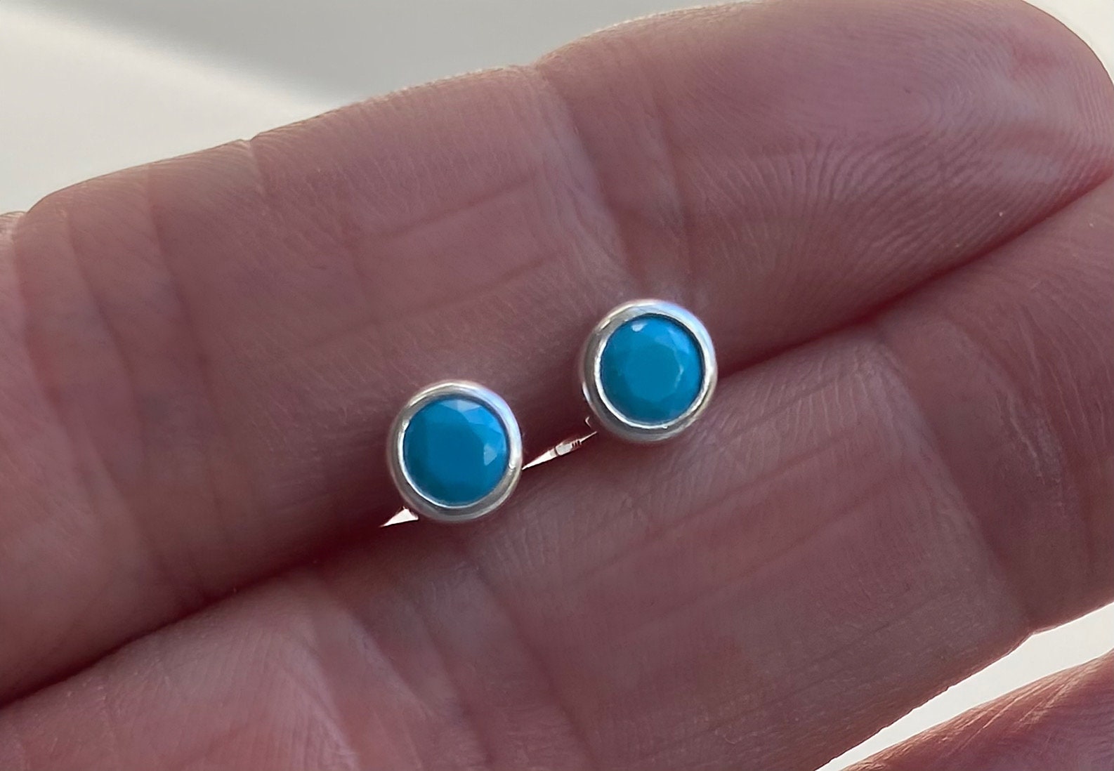 Close-up of 925 silver turquoise earrings with 4mm CZ, perfect for thank-you gifts for friends.