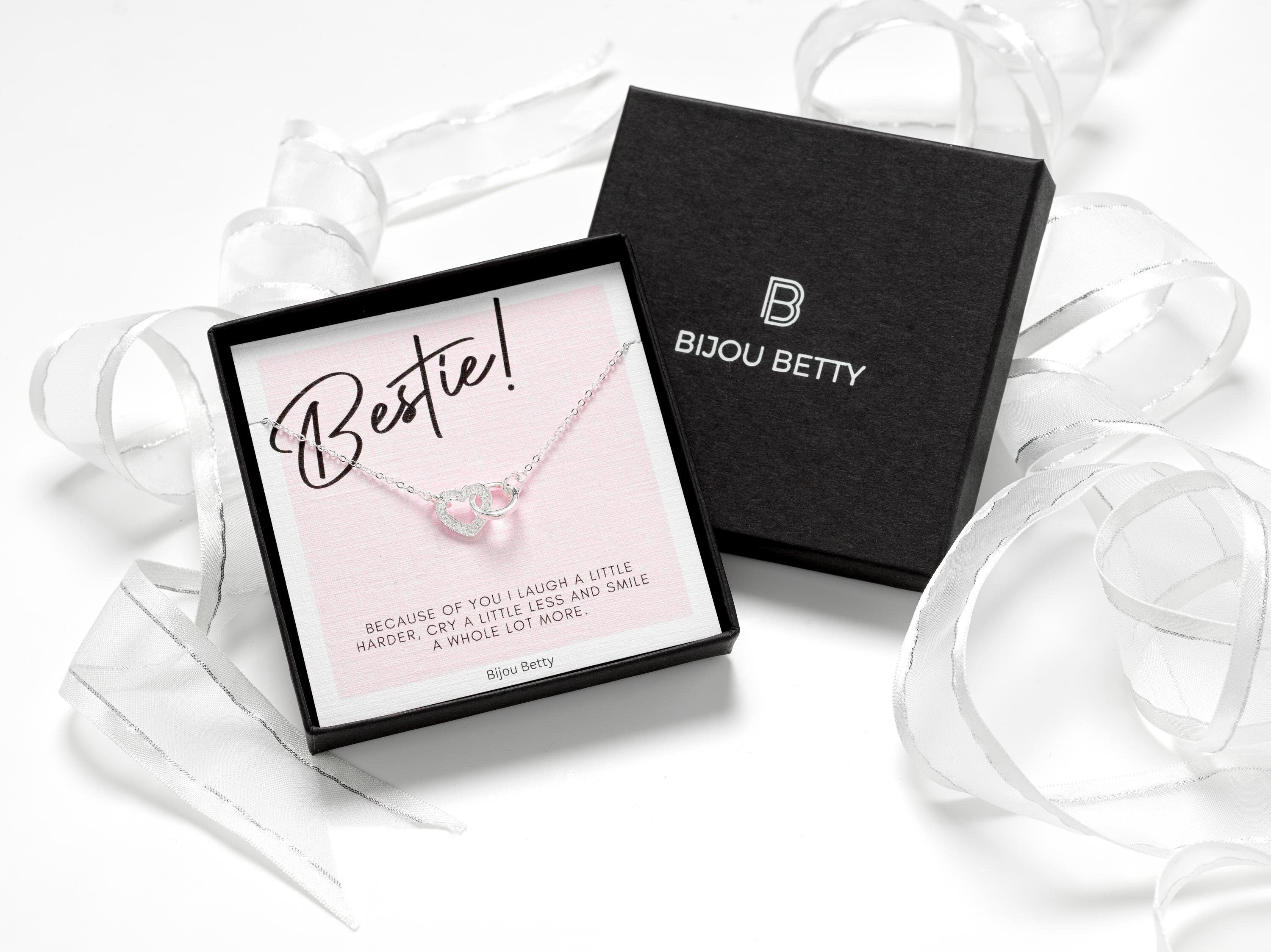 Solid silver interlinked heart and circle necklace.  Presented in a luxury gift box and matching gift bag.