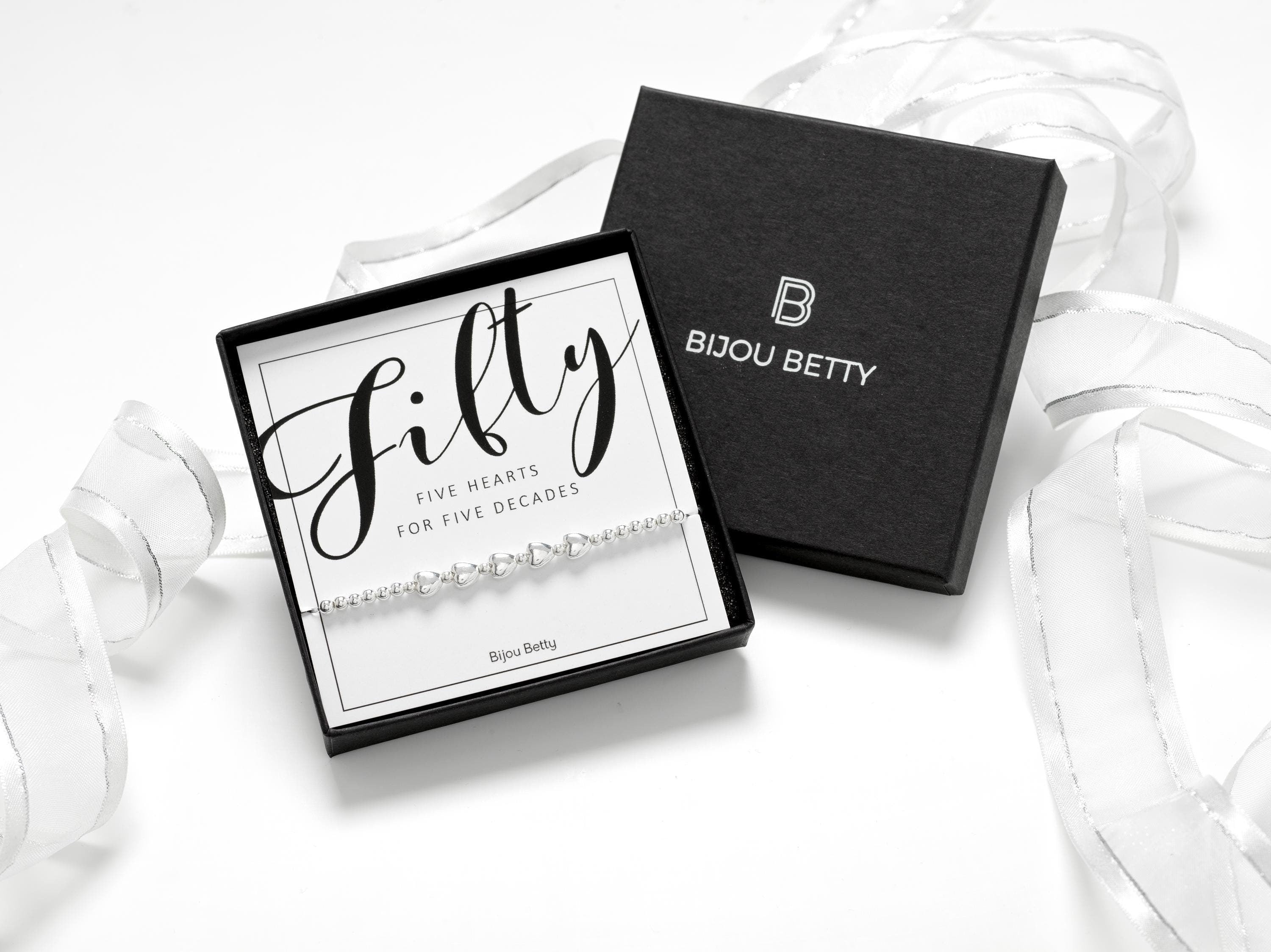 Sterling silver 50th birthday bracelet with hearts in Bijou Betty gift box