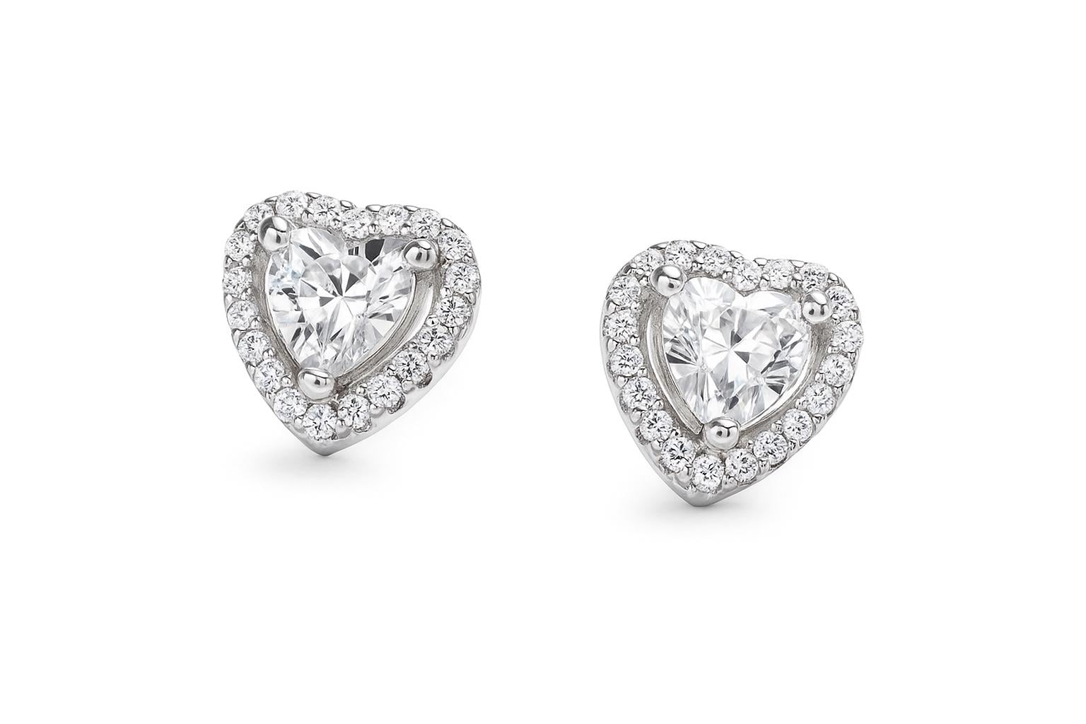 Close-up of 925 silver CZ heart earrings, ideal for 16th birthday gifts for sisters or friends.