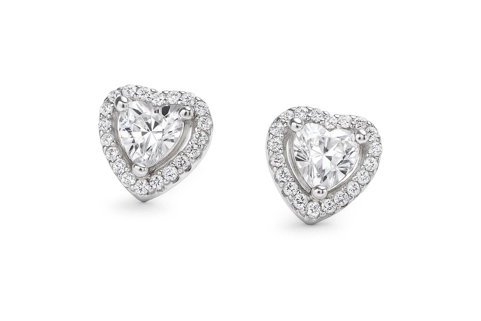 Sterling silver heart cubic zirconia stud earrings.