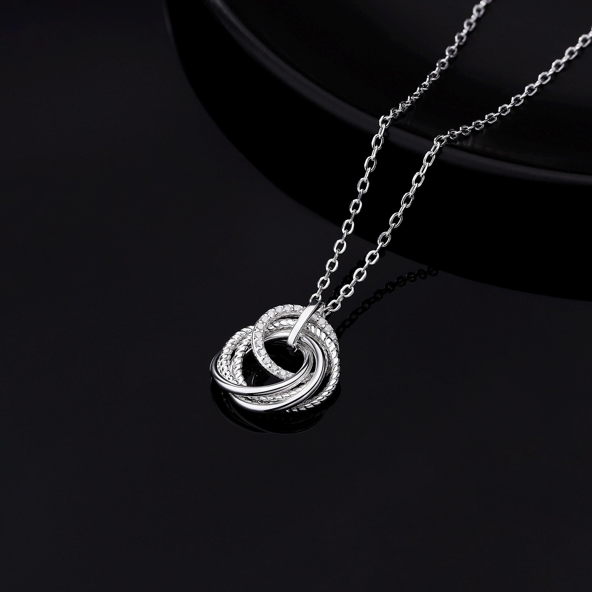 Close-up of 925 silver five-ring necklace, perfect for thank you or 50th birthday gifts for sisters.