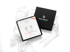 Sterling silver 50th birthday sunburst earrings in Bijou Betty gift box.