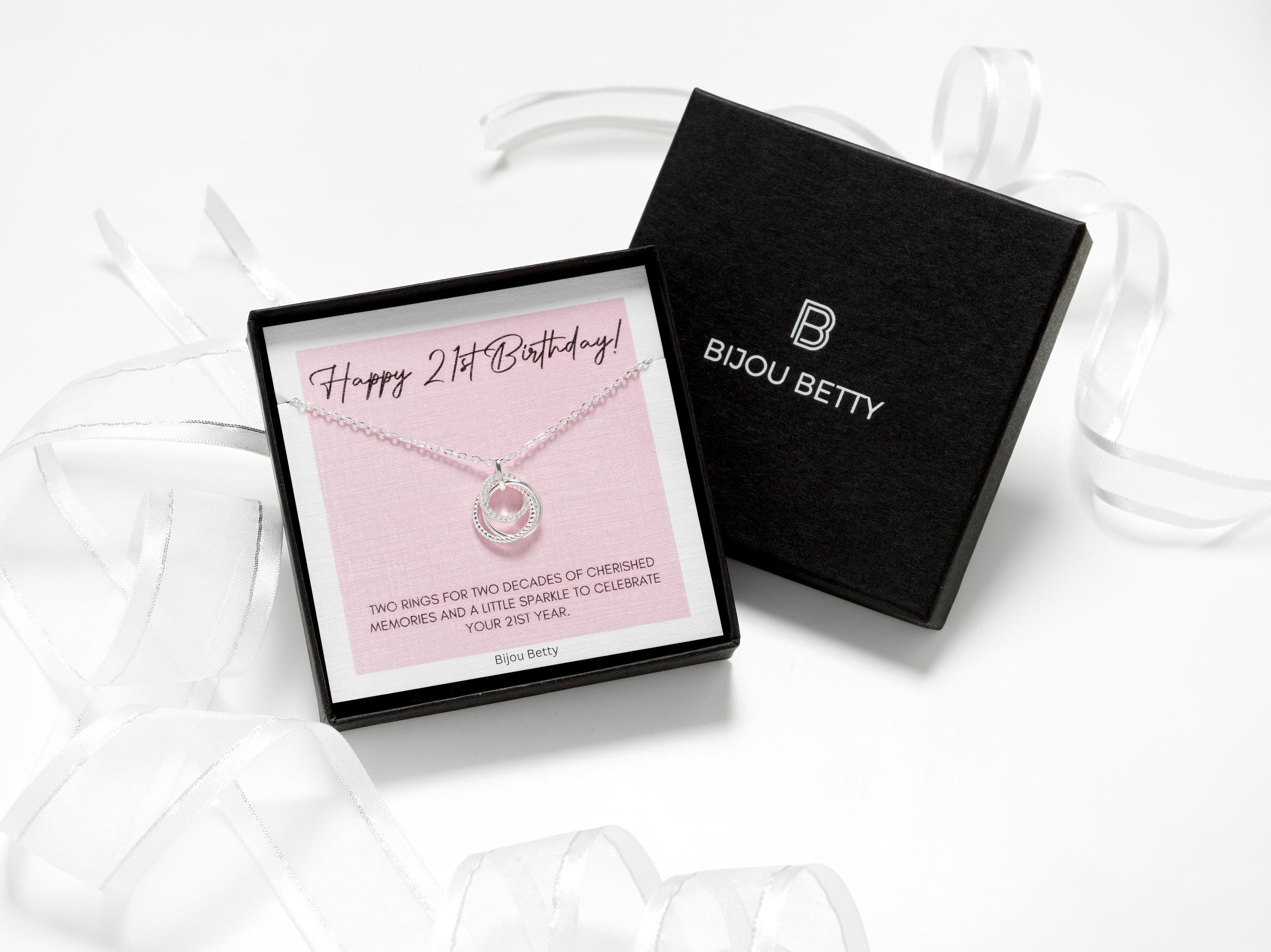 21st birthday jewellery.  A solid sterling silver three-ring necklace presented in gift box.