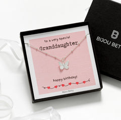 Close-up of Bijou Betty’s 925 silver butterfly necklace, 13mm x 11mm pendant, on 16–20 inch satellite chain, white background.