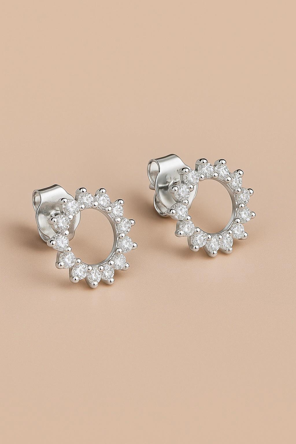 Close-up of Bijou Betty’s 925 silver sunburst stud earrings, 10mm with cubic zirconia in sterling silver.