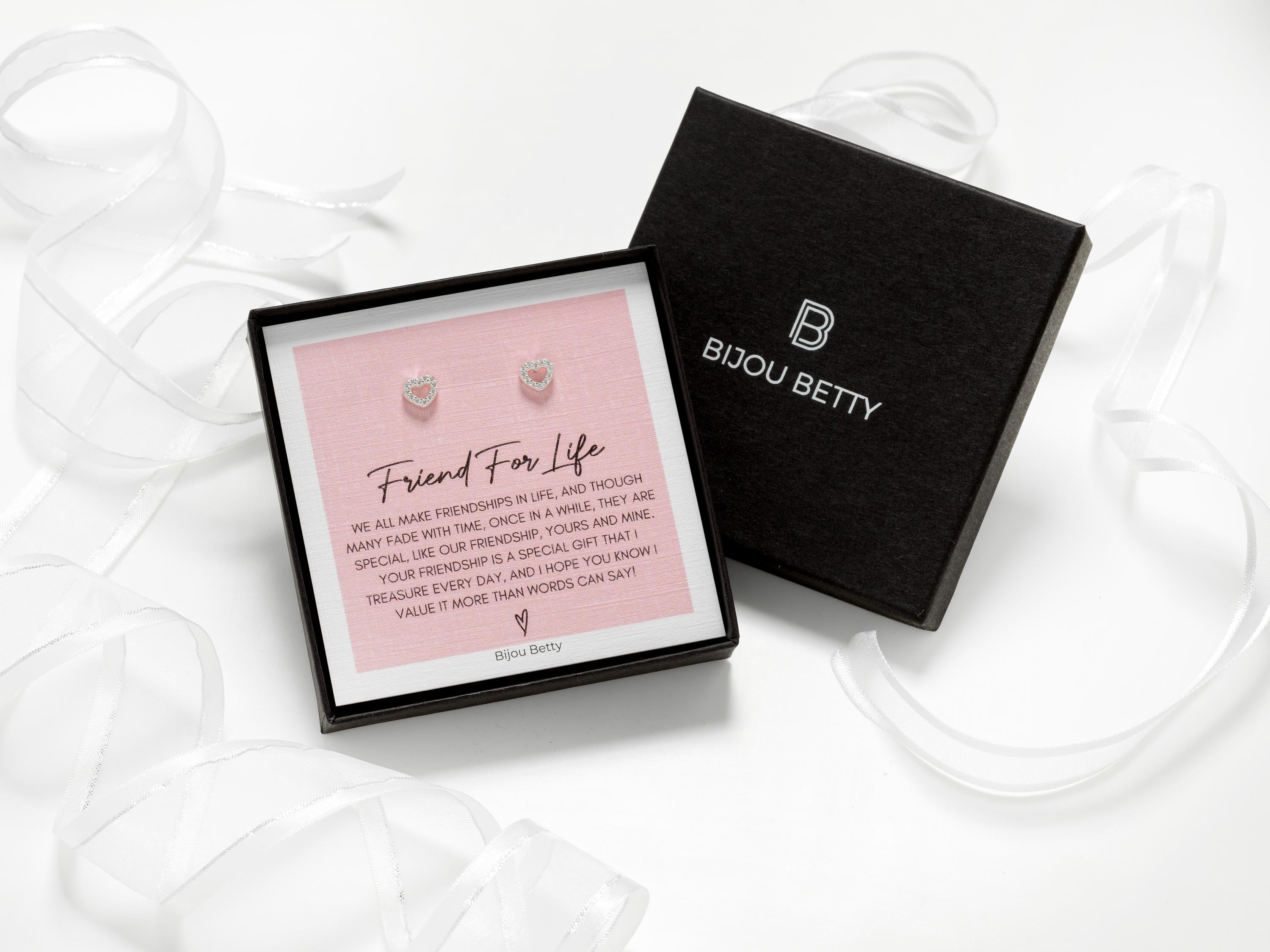 Sterling silver 6mm x 7mm open-heart stud earrings in Bijou Betty gift box with friendship card, ideal for best friend gift.