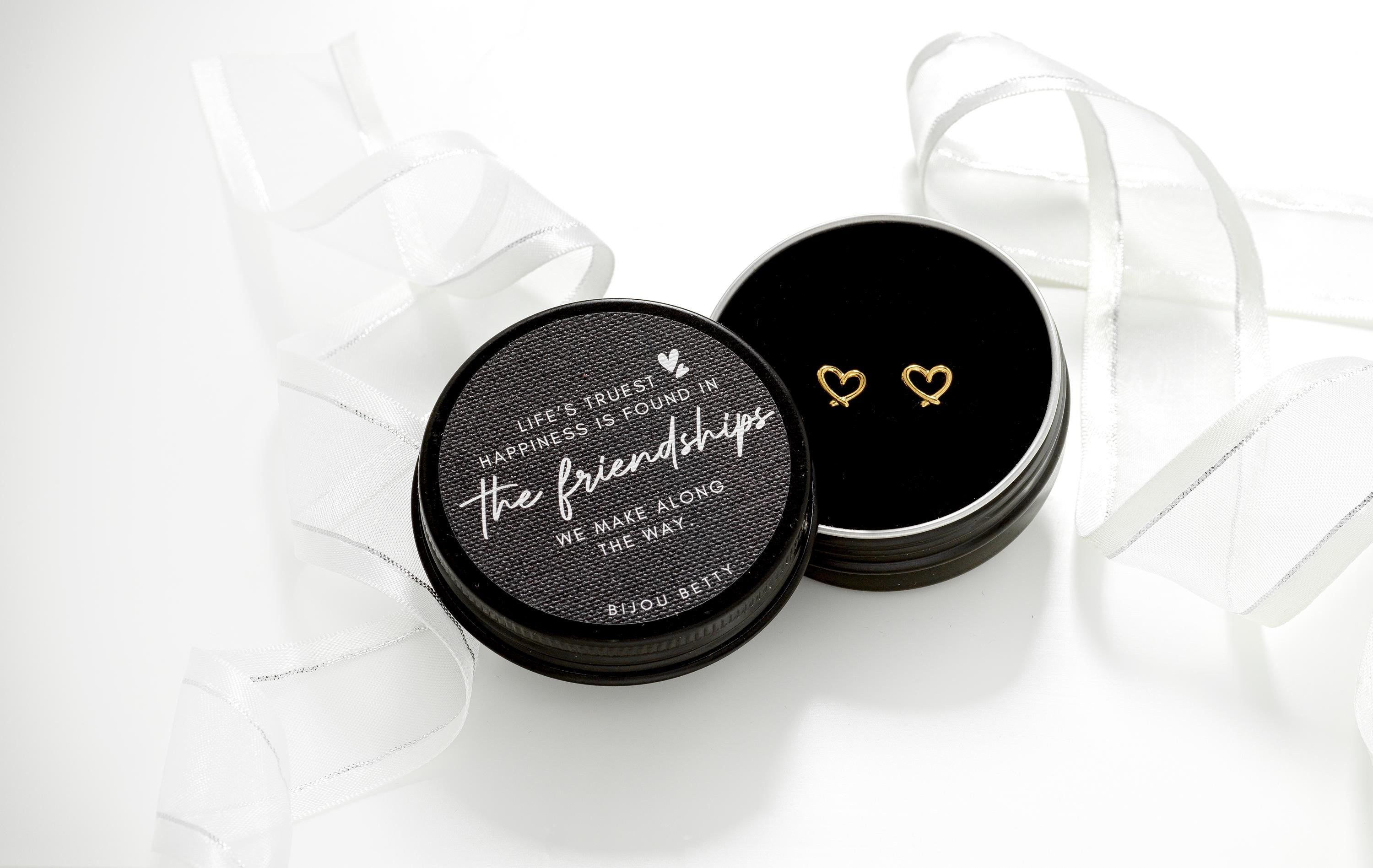 Gold-plated stainless steel 7mm heart stud earrings in Bijou Betty gift box with friendship quote, ideal for birthdays.