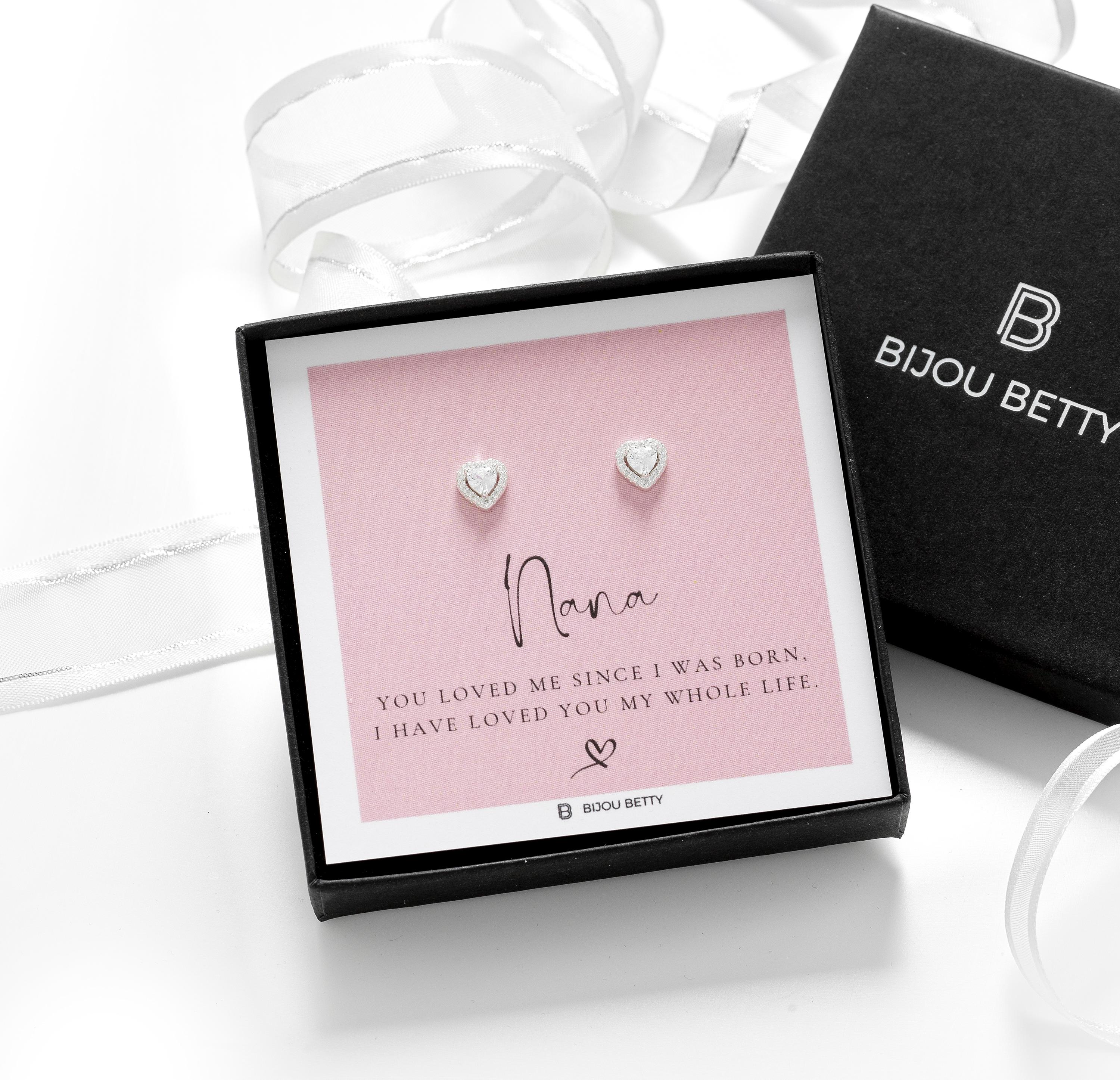 Close-up of 925 silver CZ heart earrings with gold-plated finish, perfect for Christmas nana gifts.